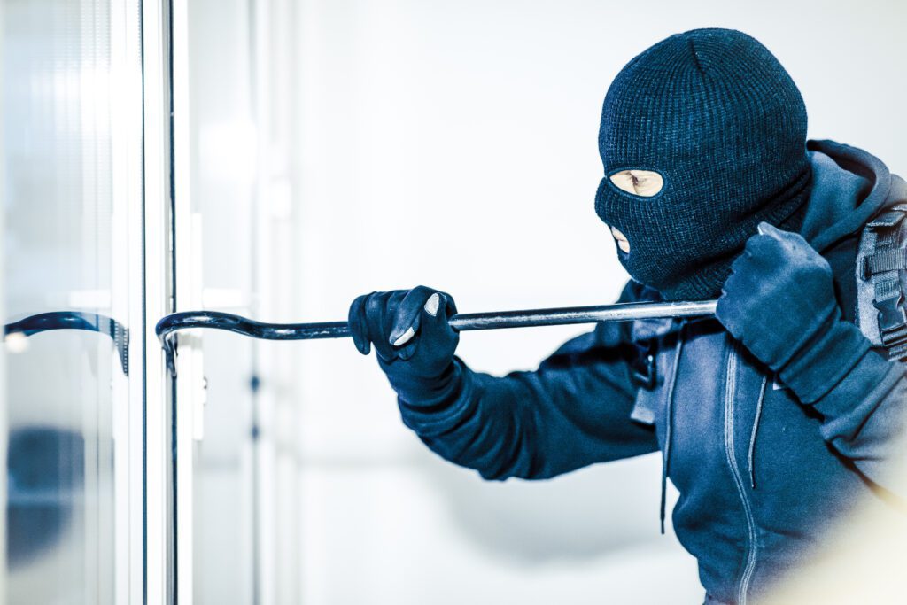 A burglary breaking into a property of a home in USA that doesn't have security window film